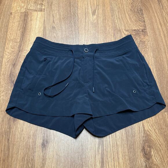 Athleta Women Navy Blue Drawstring Dry Fit Zipper Pocket Shorts Size 4 Inseam 3"